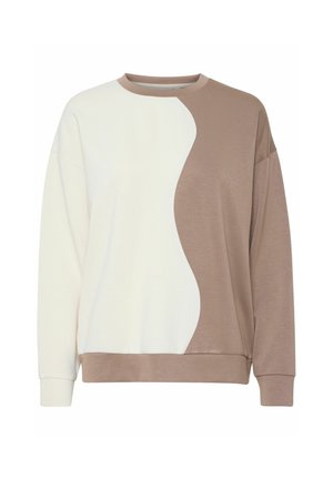 Sudadera con diseño de bloques de color en crema y marrón claro, con detalles de dobladillo curvado y puños acanalados. Textura suave, ajuste informal.