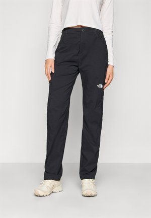 Black outdoor pants made of lightweight fabric with a straight cut, featuring two side pockets and a small logo on the right thigh.