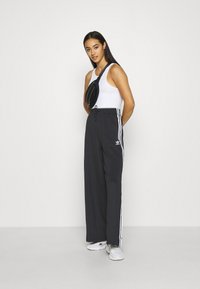 adidas Originals RELAXED PANT  - Pantaloni sportivi - black