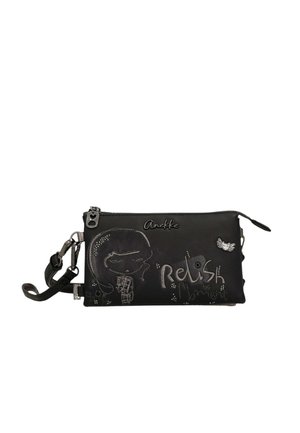 Braccialetto nero rettangolare con cerniera, con una ragazza dei cartoni animati, testo ""Relish the moment"" e cinturino staccabile con fibbia metallica.