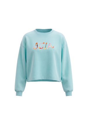 Lyseblå cropped sweatshirt med lange ærmer, ribbet manchetter og farverig blomsterbroderi, der staver "OZIA" på brystet.