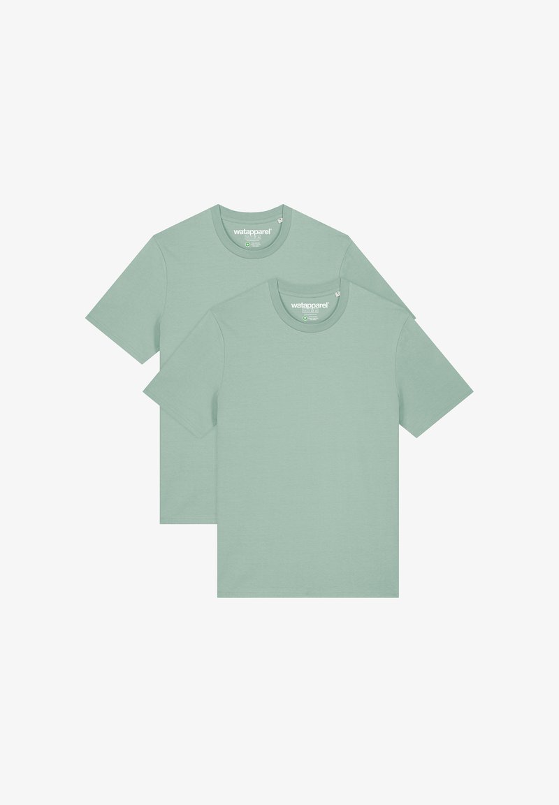 Deux t-shirts verts clair à manches courtes en coton doux, avec un col rond et un design simple et sans couture.