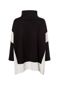 Schwarzer und weißer übergroßer Pullover mit hohem Kragen, der mutige geometrische Farbkombinationen und lässige Dreiviertelärmel aufweist.