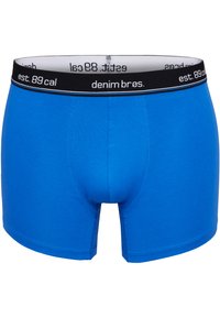 Blaue Baumwollboxershorts mit einem schwarzen Bund, der weißen Text enthält. Glatte Textur, enganliegendes Design und Oberschenkellänge.
