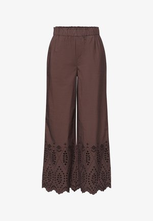 Pantalon marron à jambes larges avec taille élastique et broderie anglaise complexe le long de l'ourlet festonné.
