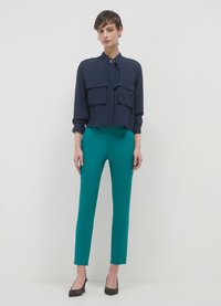 Calliope Chino - verde petrolio