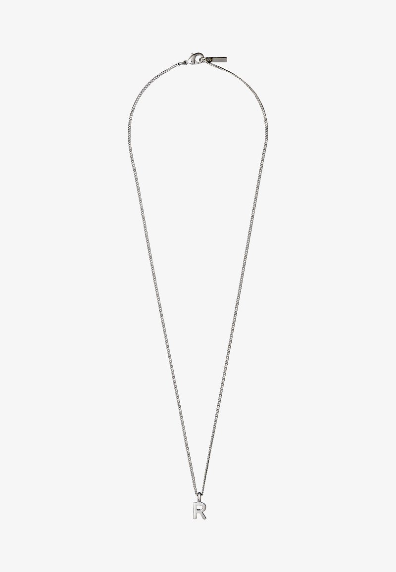 Silver necklace with a fine chain and a small letter "R" pendant. The chain features a spring clasp and has a minimalist design.