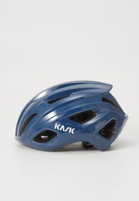 Blue cycling helmet featuring a sleek, aerodynamic design with ventilation cutouts, matte finish, and adjustable fit. KASK logo visible.
