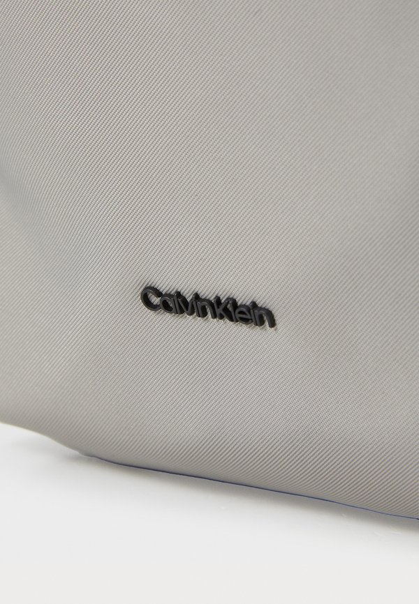 BUSINESS TECH REPORTER  - Cross body bag - rock ridge3