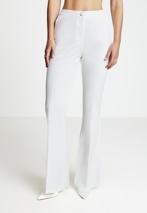 LUNGO TINTA UNITA - Stoffhose - bianco lana