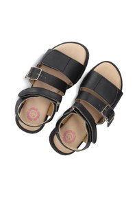 Zwarte leren sandalen met twee verstelbare banden en een gesp. Zachte tan voetbed met een roze cirkelvormig logo. Glad, geweven afwerkingen.