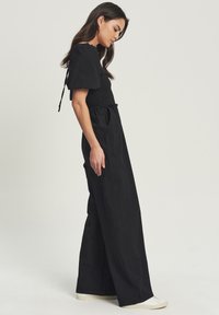 CALLI CORA - Mono - black
