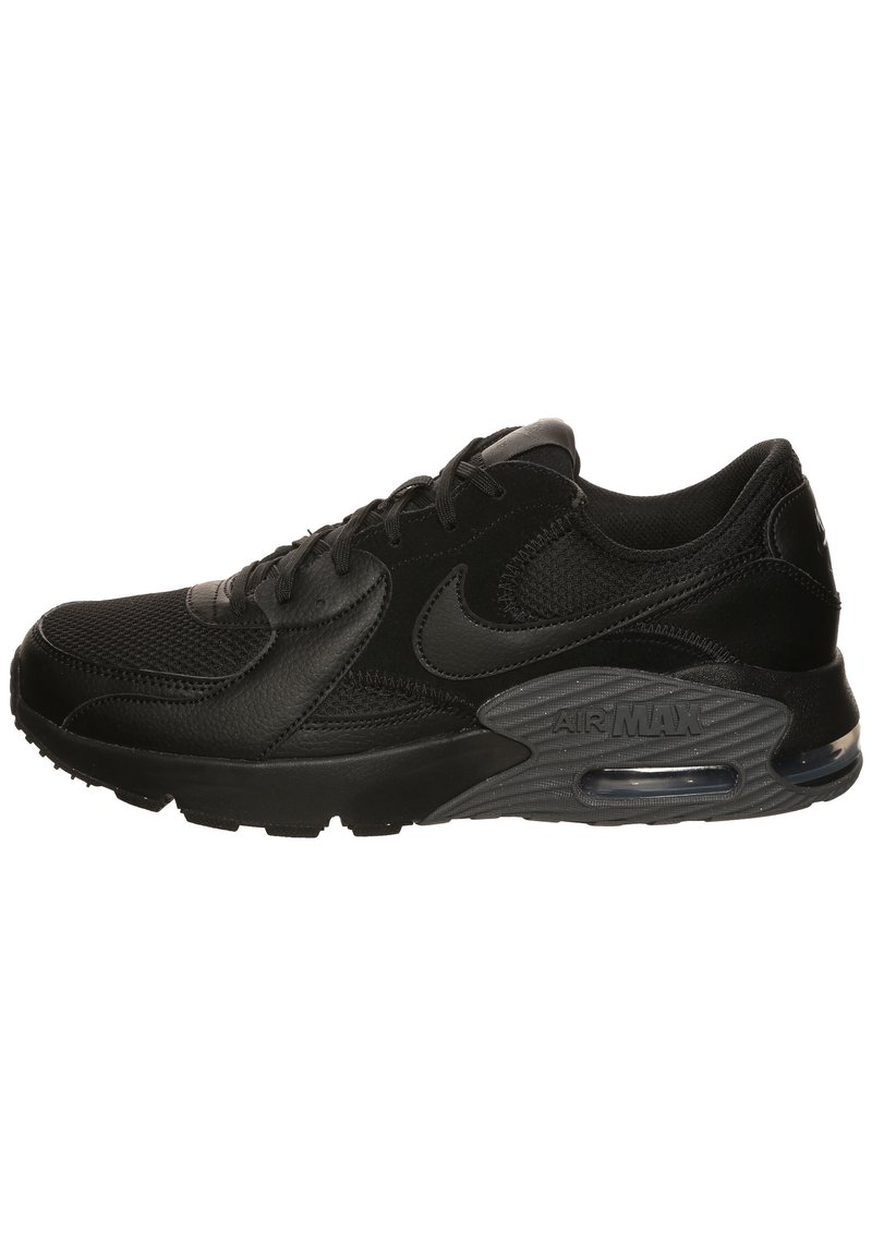 Black Nike Air Max sneakers with a mesh upper, padded collar, and visible air cushioning in the heel. Features textured leather accents and rubber sole.
