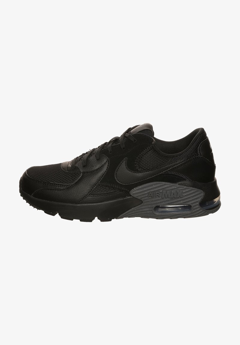 Black Nike Air Max sneakers with a mesh upper, padded collar, and visible air cushioning in the heel. Features textured leather accents and rubber sole.