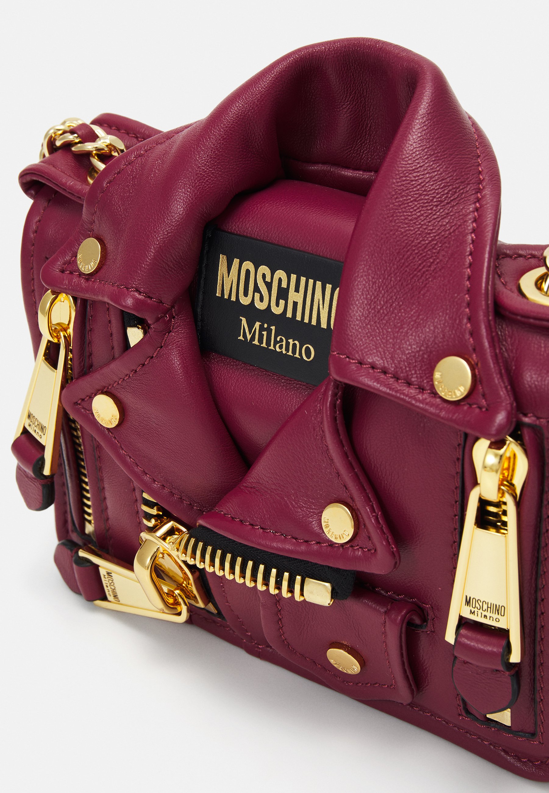 バッグ mokorooon MOSCHINO BIKER BAG - Geantă crossbody - viola/roz - Zalando.ro