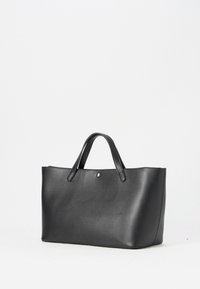 Black tote bag made of smooth synthetic material. Features two handles and a small silver-tone hardware stud on the front. Rectangular shape.