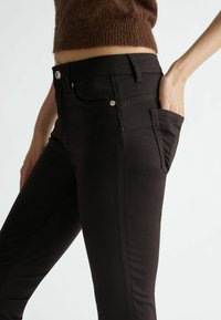 LIU JO BOTTOM UP  - Pantaloni - black