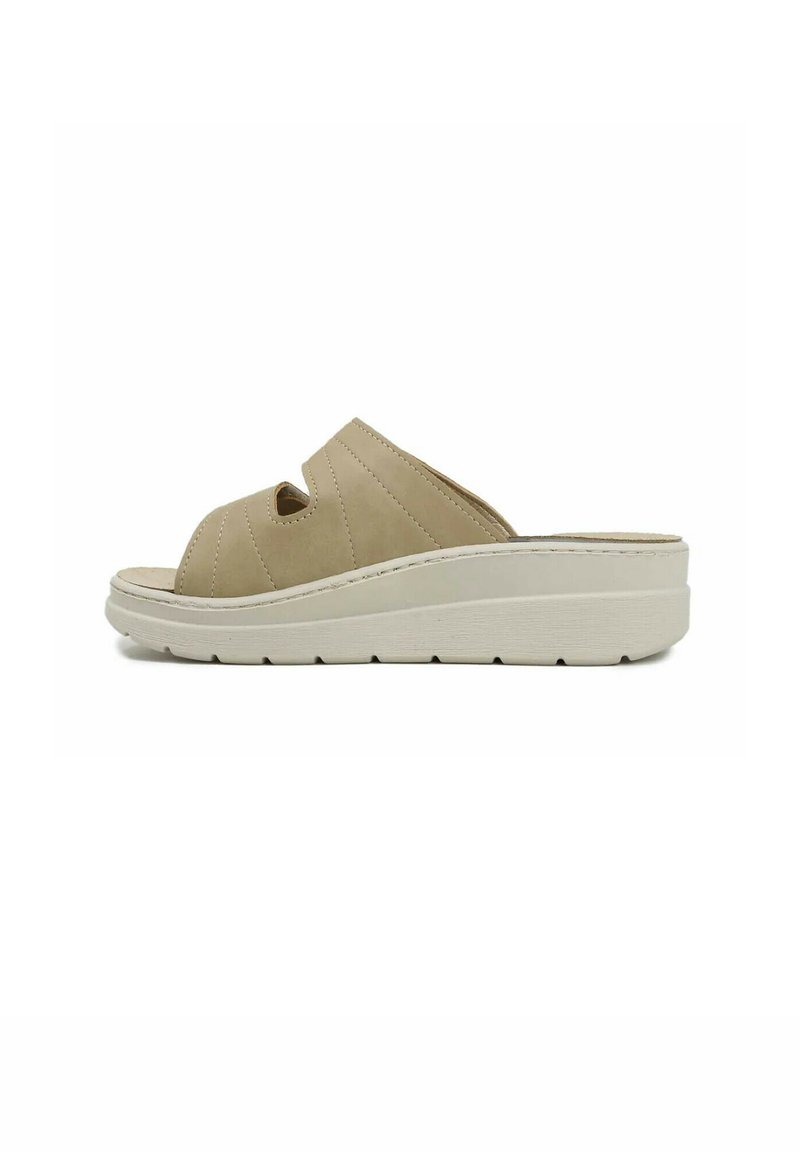 Infradito beige con una toma imbottita, caratterizzato da due aperture e una suola bianca texturizzata. Design leggero con una forma sagomata.