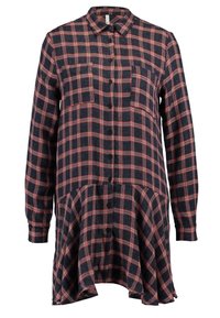 Långärmad skjorta med knappar i marinblå rutigt mönster med röda accenter, har två bröstfickor och en utsvängd, böjd nederdel. Blandning av bomull.
