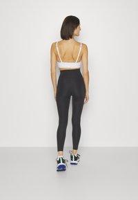Endless MALLAS CROSS POCKET - Leggingek - black