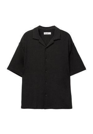 Chemise noire à manches courtes avec un col, dotée d'un devant à boutonnière et d'un tissu texturé. Coupe décontractée, design casual.