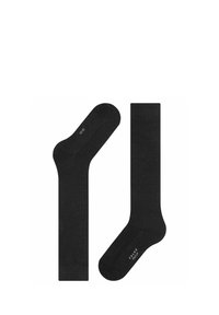 Schwarze Baumwollsocken mit glatter Textur, in Crew-Länge und mit subtiler Markenkennzeichnung an der Sohle. Einfaches Design ohne Muster.