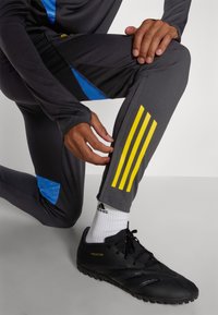 adidas Performance MANCHESTER UNITED PANT - Klubu apģērbs - black/blue/tribe yellow