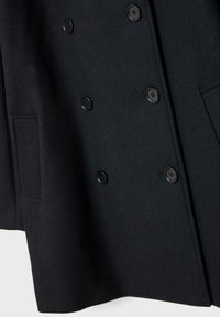 Sort uld dobbeltknappet frakke med seks sorte knapper, en tekstureret overflade og sidelommer, samt en struktureret silhuet.