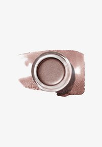 Metallischer Cremelidschatten in einem klaren Behälter, umgeben von einem sanften, schimmernden roségoldenen Puder. Sanfte Textur und kreisförmige Form.