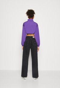 Tommy Jeans Corta-vento - college purple
