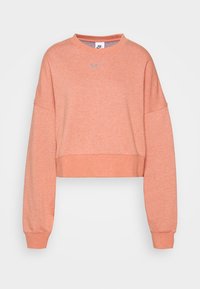 Coral cropped sweatshirt made of soft fabric, featuring a round neckline and long sleeves. Small silver logo on the front.