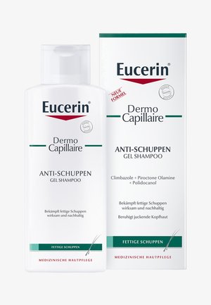 Eucerin Dermo Capillaire Anti-Schuppen Gel Shampoo in einer klaren Flasche, mit weißem Etikett und grünen Akzenten. Zutaten und Anwendungstext auf Deutsch.