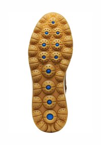 Suela de zapato con tacos de goma amarillos circulares que presentan esferas azules incrustadas y pequeñas perforaciones para mejorar el agarre y la flexibilidad.