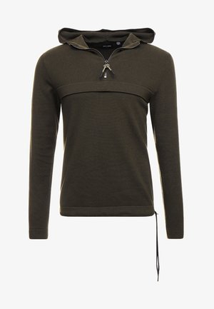 Sweat à capuche olive en tissu texturé, doté d'une demi-fermeture éclair, d'un ourlet à cordon de serrage et d'une bande horizontale à travers la poitrine.