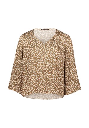 Blouse imprimé léopard beige et marron avec col en V et manches larges trois-quarts, coupe ample, tissu léger.