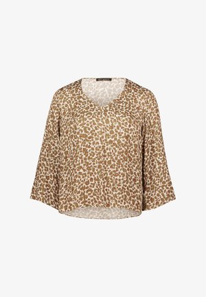 Blouse imprimé léopard beige et marron avec col en V et manches larges trois-quarts, coupe ample, tissu léger.