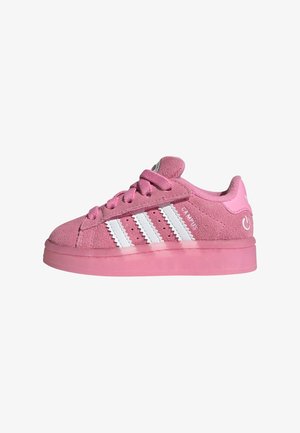 Pink suede Adidas Campus sneaker with white stripes, laces, and translucent pink sole, viewed from the side.