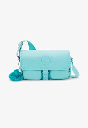 Sac bandoulière turquoise en tissu doux. Il dispose d'une fermeture à rabat, d'une sangle réglable et d'un porte-clés gorille pelucheux attaché.
