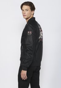 Koroshi EFFECT  - Műbőr dzseki - black