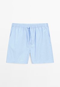 Lichtblauwe, knielange shorts van ademende stof. Voorzien van een elastische tailleband met een trekkoord en zijzakken.
