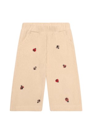 Beige ribfluwelen peuterbroek met elastische tailleband en geborduurde rode en zwarte lieveheersbeestjes verspreid over de voorkant.