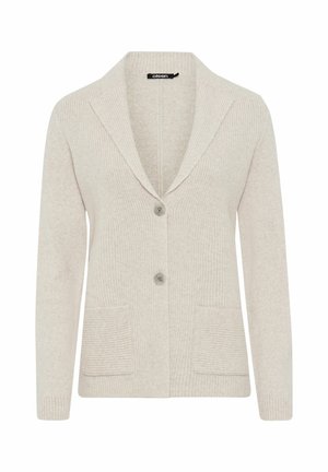 Helle beige Strickjacke mit gerippter Textur, weichem Reverskragen, zwei aufgesetzten Taschen und einem einzigen Knopfverschluss. Weiches Material, lässige Passform.
