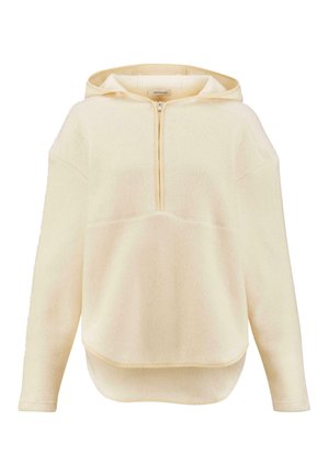 Pullover con cappuccio color crema realizzato in tessuto morbido e strutturato. Presenta una zip parziale sul davanti e un orlo curvo per una vestibilità rilassata.