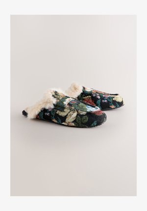 Kukkakuvioiset tohvelit, joissa musta kangaspinta ja pehmeä kerma-valkoinen tekoturkisvuori, matala malli ja joustavat pohjat.