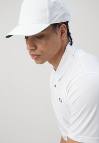 Oakley ICON PROTECT  - Pólóing - white
