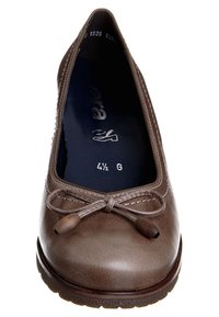 Brown leather ballet flat with a rounded toe, decorative bow, and minimal stitching. Textured sole for grip, designed for comfort.