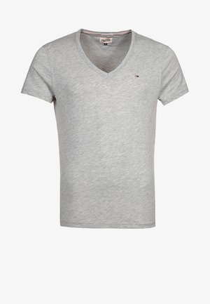 Graues V-Ausschnitt T-Shirt aus weichem Baumwollmischgewebe. Verfügt über kurze Ärmel und ein kleines Logo auf der linken Brust. Klassische Passform.