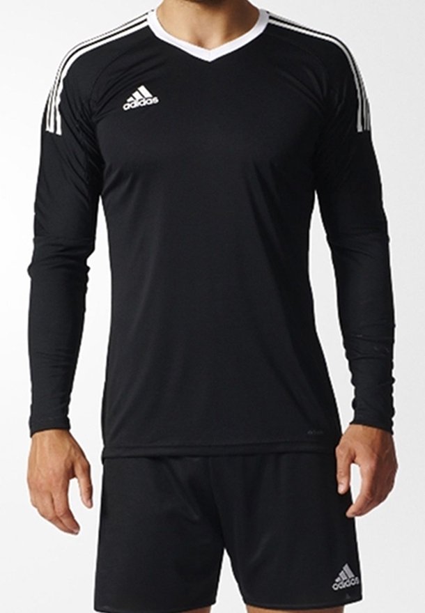 Maillot de sport noir à manches longues avec des accents blancs, présentant un design en col en V et trois bandes sur chaque épaule. Fabriqué en matériau respirant.