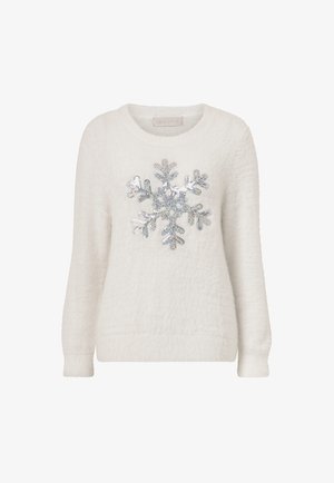 Hvid fuzzy sweater med en struktureret finish og et glitrende sølv snefnug design i midten. Langærmede og med rund halsudskæring.