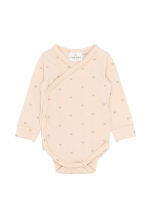 Kremowy, długirekawowy body dla niemowląt z beżowymi wzorami serc i zatrzaskami po bokach oraz u dołu.